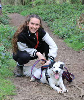 Amy Challis, owner of AC Dog Academy with her dog on a lead